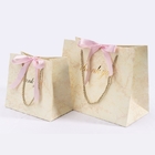 Les sacs à provisions de papier de conception minimaliste avec des poignées rayent résistant