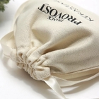 Le cadeau de cordon de tissu de coton met en sac la sucrerie emploient déjouer emboutissant la surface